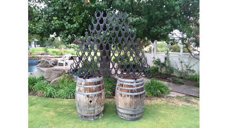 Black Metal Horse Shoe Wine Rack | Rental