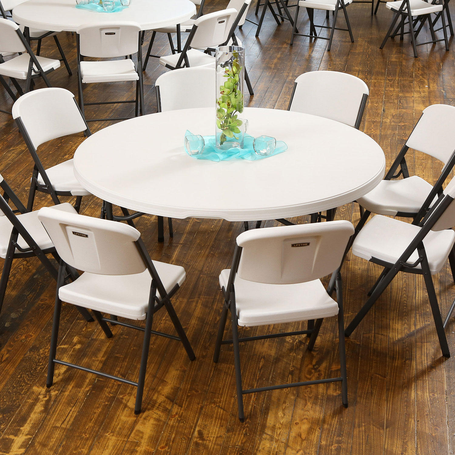 Package – (4) 60″ Round Commercial Grade Folding Tables and (32) Folding Chairs | Rental