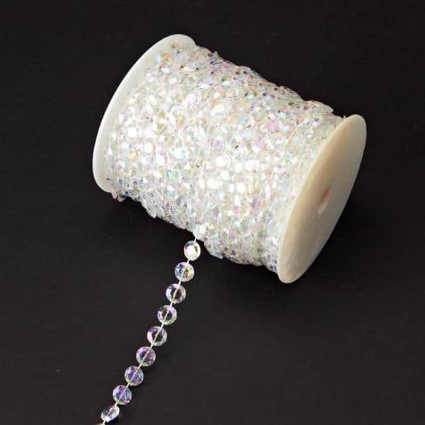 Decostar™ Crystal Iridescent Diamond Cut Beads – Garland Roll – 99ft | Rental Decostar™ Crystal Iridescent Diamond Cut Beads – Garland Roll – 99ft | Rental