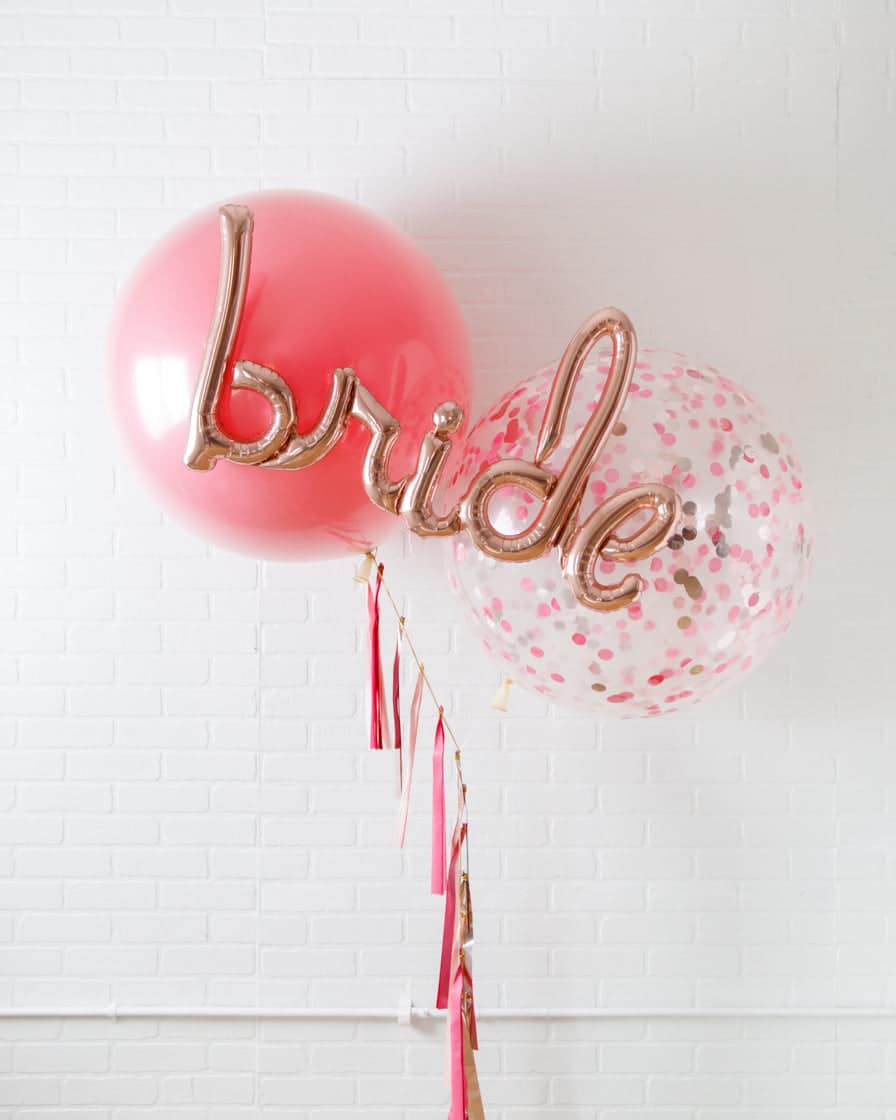 Life in Plastic – Giant Bouquet with Bride Script & Tassel | Rental Life in Plastic – Giant Bouquet with Bride Script & Tassel | Rental